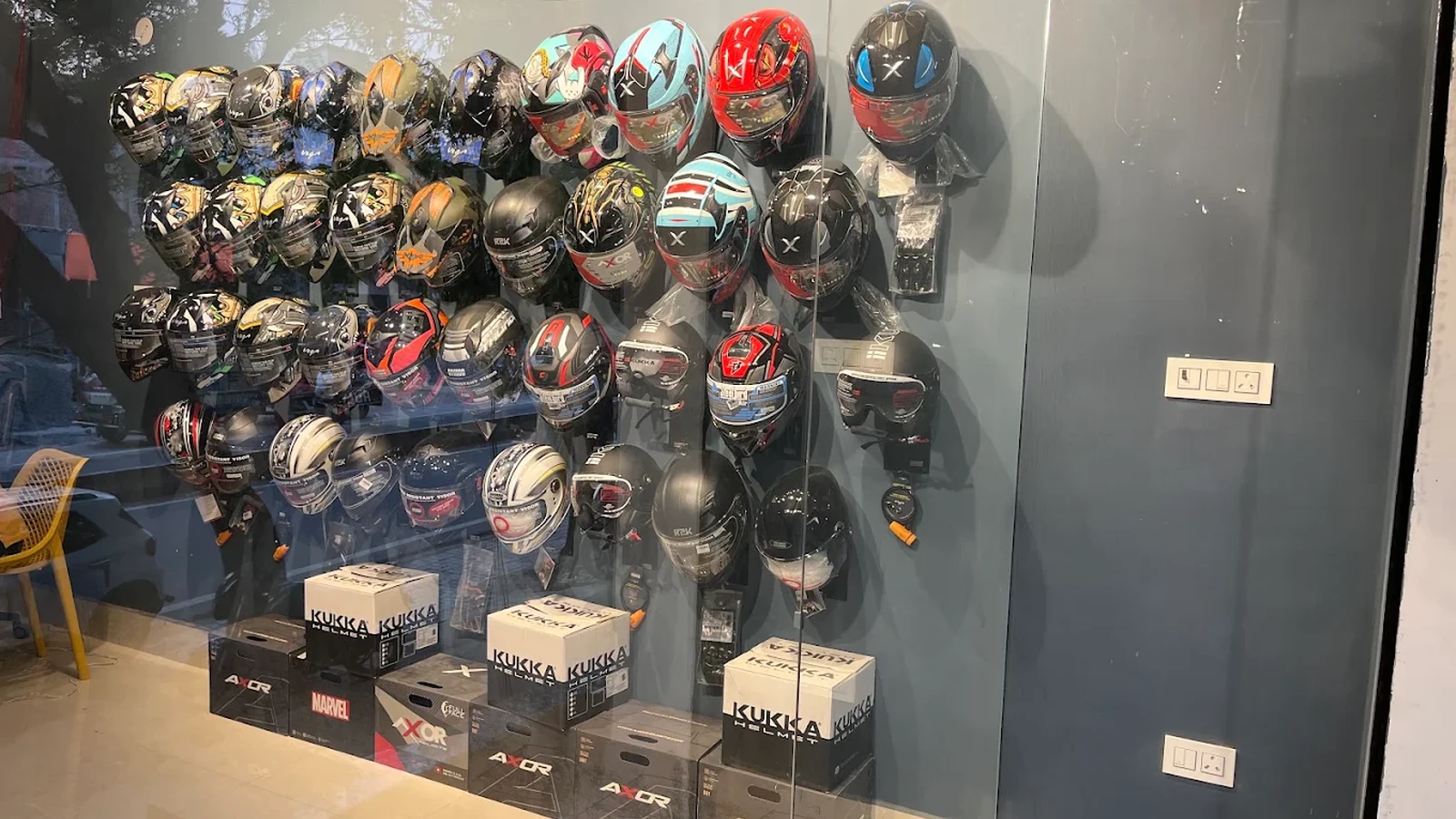 Wall of certified Axor, Steelbird, Vega and Studds helmets at Bikers Accessories Bihar Sharif